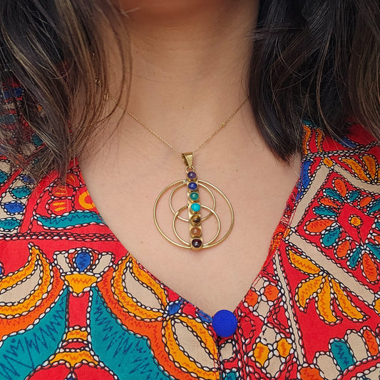 Discover the Wheel of Life Brass Pendant at Bliss Boho. This symbolic pendant represents the cycle of life and adds spiritual significance to your style.